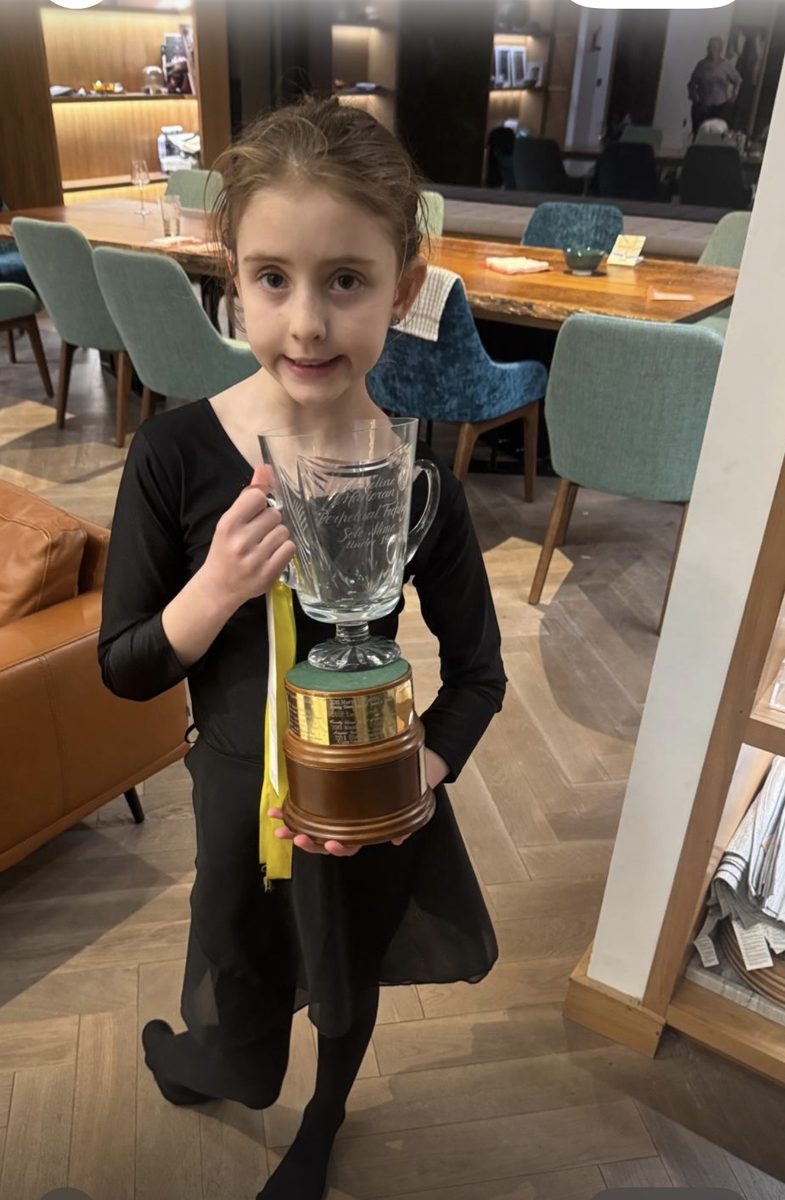 Student with trophy